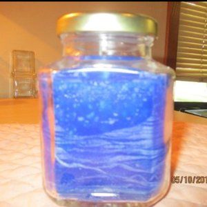 Baking Cupcake Candle 18 oz. 4 1/4" high X 2 1/2" & 3" wide